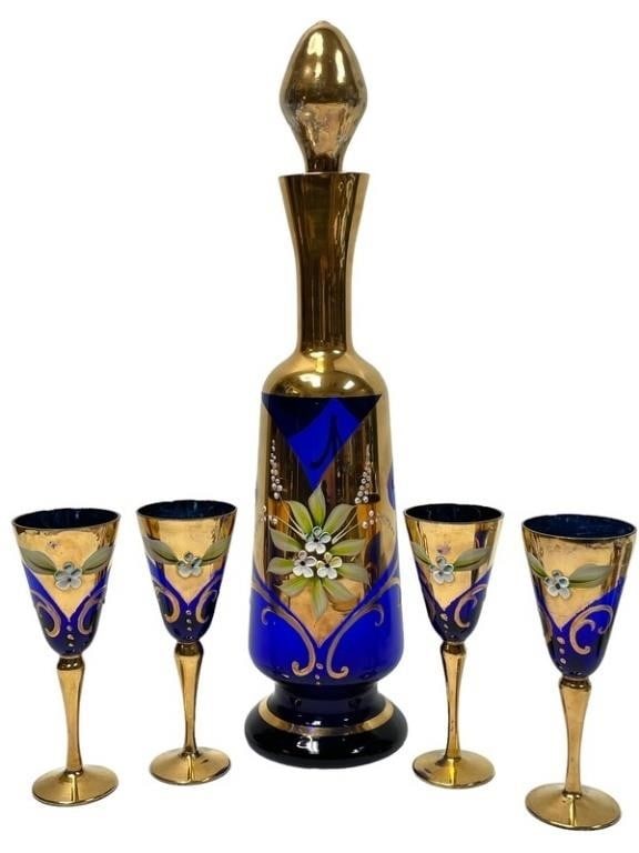 VTG COBALT BLUE & GOLD WINE DECANTER & GLASSES: VINTAGE VENETIAN COBALT BLUE AND GOLD WINE DECANTER AND 4 GLASSES -15" H APPROX TO DECANTER -5" H TO GLASSES -VERY GOOD PRE OWNED CONDITION -DP41124 Bidders may pick up their items from the auc