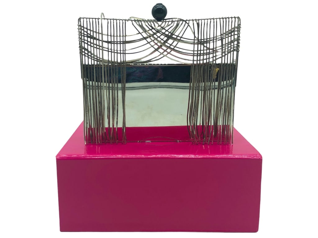 NWT BENEDETTA BRUZZICHES SILVER METAL CLUTCH $2215: - NWT BENEDETTA BRUZZICHES SILVER METAL CLUTCH $2215 - MADE IN ITALY | COMES WITH BOX, TAG, AND DUSTBAG - DECORATIVE SILVER FRINGING - CAN USE AS A HANDBAG Bidders may pick up their items from 