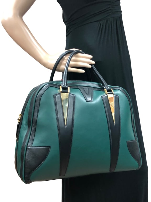 NWT GEORGE ANGELOPOULOS EUFROSINI DUFFLE BAG $1595: - NWT GEORGE ANGELOPOULOS EUFROSINI DUFFLE BAG $1595 - MADE IN ITALY | COMES WITH DUSTBAG, DUST WIPE, AND TAGS - FOREST GREEN AND BLACK LEATHER WITH GOLD ACCENTS - GF 11/17/23 Bidders may pick 