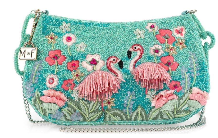 NEW MARY FRANCES FLIRTY FLAMINGOS HANDBAG: Tropical Paradise Design: The Mary Frances Flirty Flamingos Beaded Crossbody Handbag invites you to step into a tropical paradise with flamboyant flamingos. Shimmering turquoise beadwork meets a flock