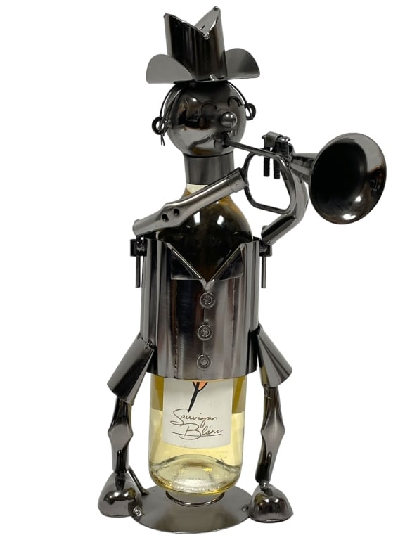 TRUMPET MUSICIAN METAL WINE BOTTLE HOLDER: TRUMPET JAZZ MUSICIAN METAL WINE BOTTLE HOLDER CHARACTER -VERY GOOD PRE OWNED CONDITION , HOLDER ONLY -DP72624 Bidders may pick up their items from the auction-house or have their items shipped