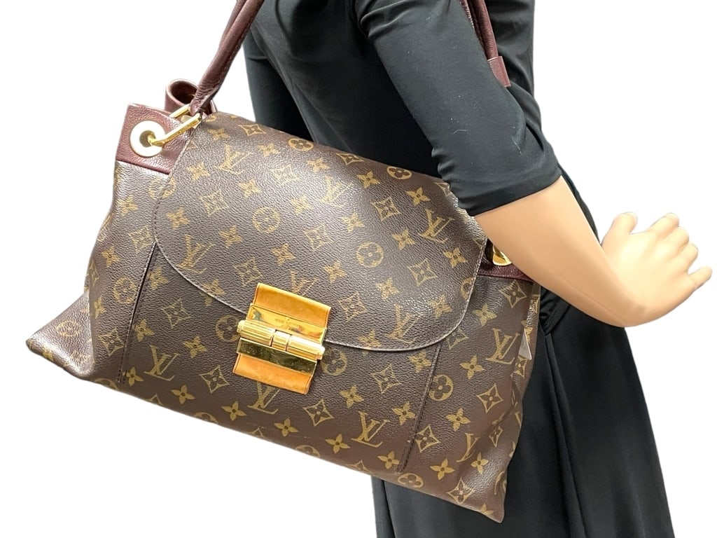 LOUIS VUITTON OLYMPE MONOGRAM CANVAS SHOULDER BAG (1 of 8)