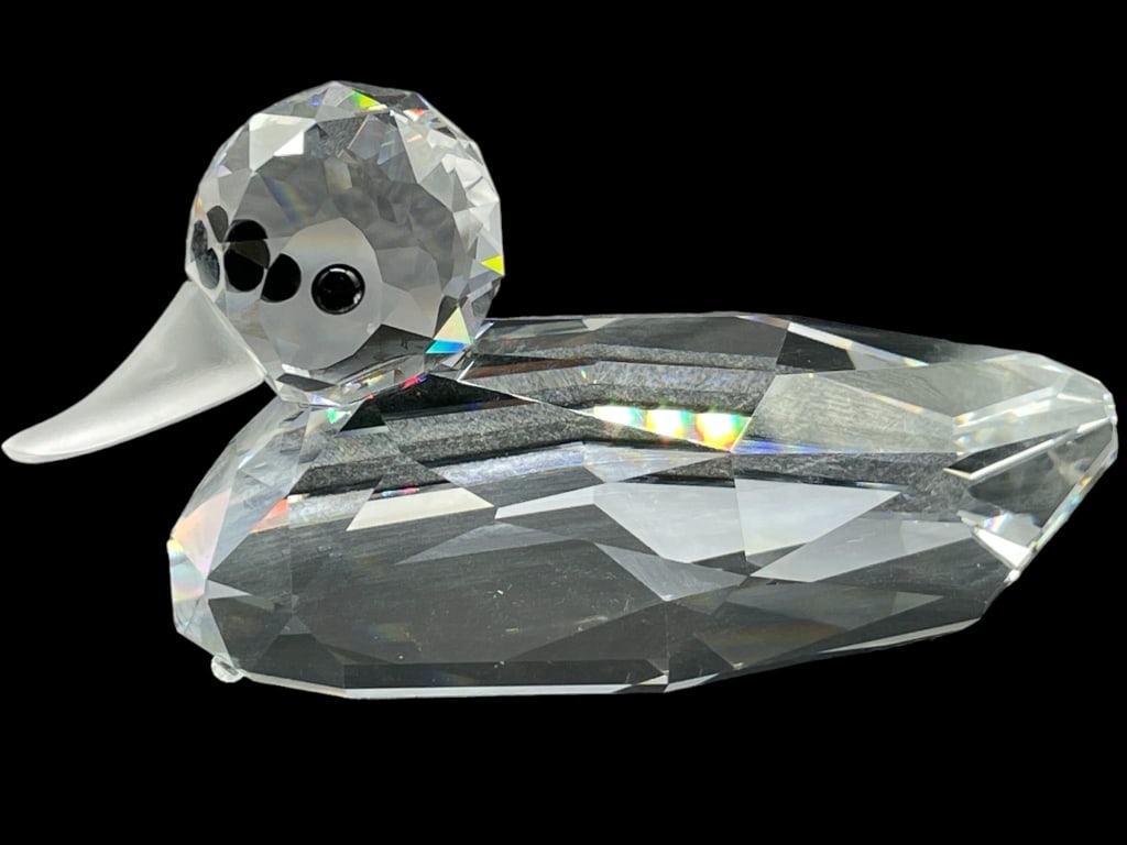 SWAROVSKI CRYSTAL DUCK FIGURINE: SWAROVSKI CRYSTAL DUCK FIGURINE -VERY GOOD PRE-OWNED -SIZE 6.5" X 3" APPROX -MA082624 Bidders may pick up their items from the auction-house or have their items shipped. Some items qualify for 