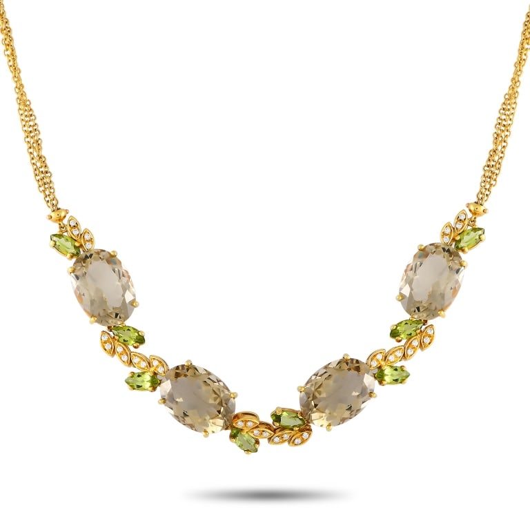 BUCHERER 18K 0.50CT DIAMOND QUARTZ PERIDOT NECKLAC: Ready for the next soire? Polish your outfit with this impressive multi-gem necklace from Bucherer. This 17-inch-long necklace in 18K yellow gold boasts a double chain detailed with an opulent trail o