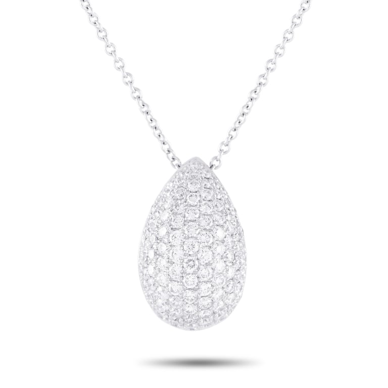BUCHERER 18K 1.22CT DIAMOND PAVE TEARDROP NECKLACE: A dazzling diamond necklace that will seamlessly fit into every woman's wardrobe. This Bucherer piece is rendered in 18K white gold. It features a 17-long chain and a domed teardrop-shaped pendant wra