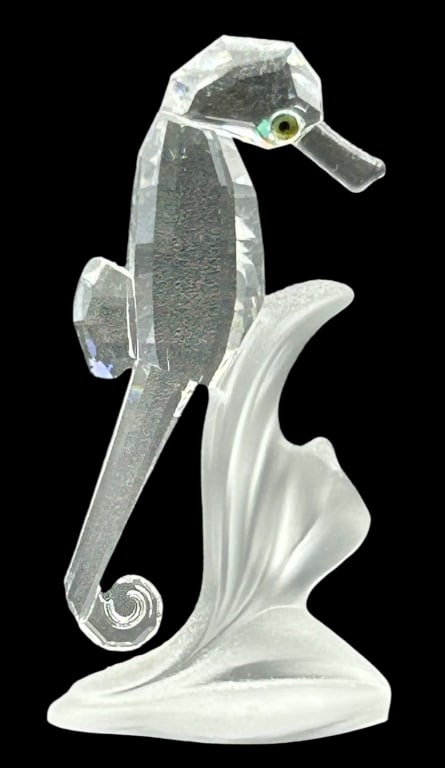 SWAROVSKI CRYSTAL SEAHORSE ON FROSTED CORAL: SWAROVSKI CRYSTAL SEAHORSE ON FROSTED CORAL 3" H x 1.5 W APPROX VERY GOOD PREOWNED CONDTION KK 9/11 #28 Bidders may pick up their items from the auction-house or have their items shipped. Some 