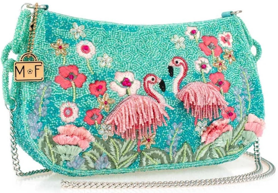 NEW MARY FRANCES FLIRTY FLAMINGOS CROSSBODY: NEW MARY FRANCES FLIRTY FLAMINGOS CROSSBODY STEP INTO A TROPICAL PARADISE WITH THIS FLAMBOYANT FLAMINGO CROSSBODY HANDBAG, WHERE SHIMMERING TURQUOISE BEADWORK MEETS A FLOCK OF PLAYFUL PINK FRINGE. SUR