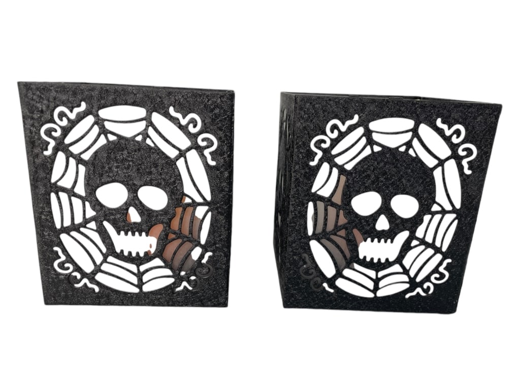 PAIR OF METAL CANDLE HOLDERS WITH ORANGE CANDLES (1 of 4)