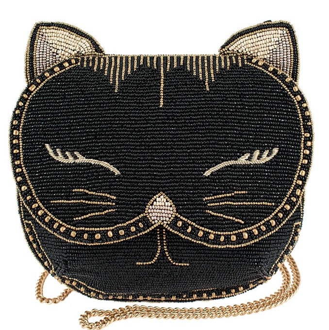 NEW MARY FRANCES WHISKERS CROSSBODY HANDBAG: 9 x 2 x 8" Removable crossbody chain strap, magnet closure, back slip pocket, "meow" embroidery under flap closure, inside slip pocket, fits cell phone.