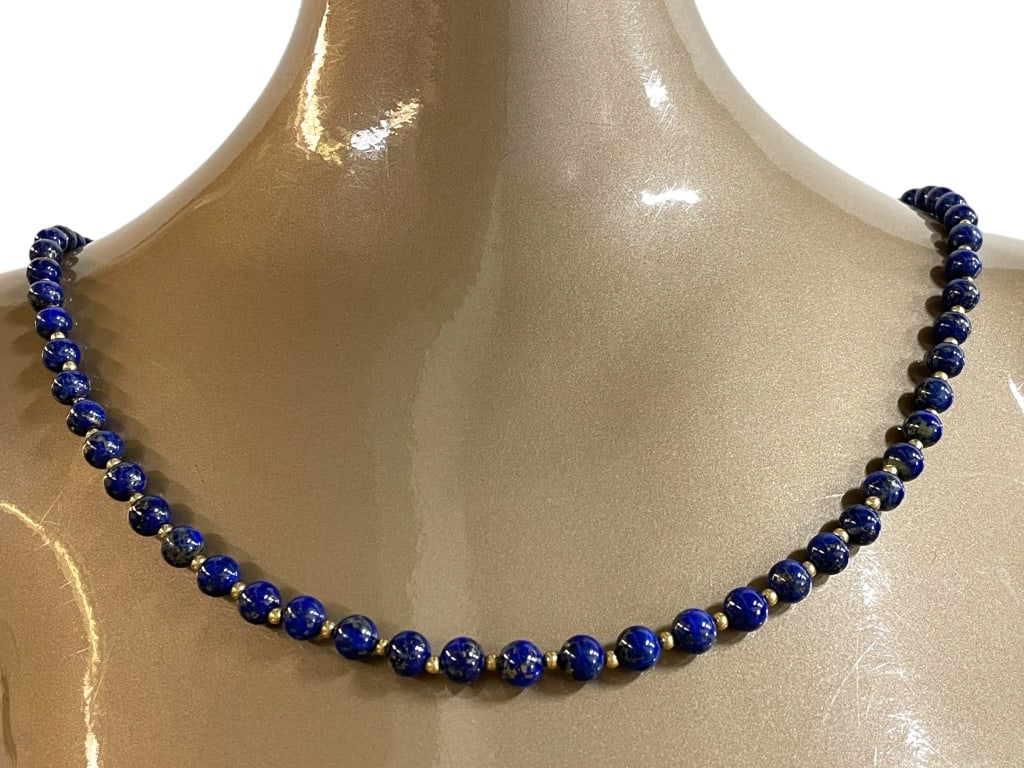 LAPIS AND GOLD BEADED NECKLACE: LAPIS AND GOLD BEADED NECKLACE -VERY GOOD PRE OWNED CONDITION -31" LONG -JA 102524 FRONT Bidders may pick up their items from the auction-house or have their items shipped. Some items qualify f