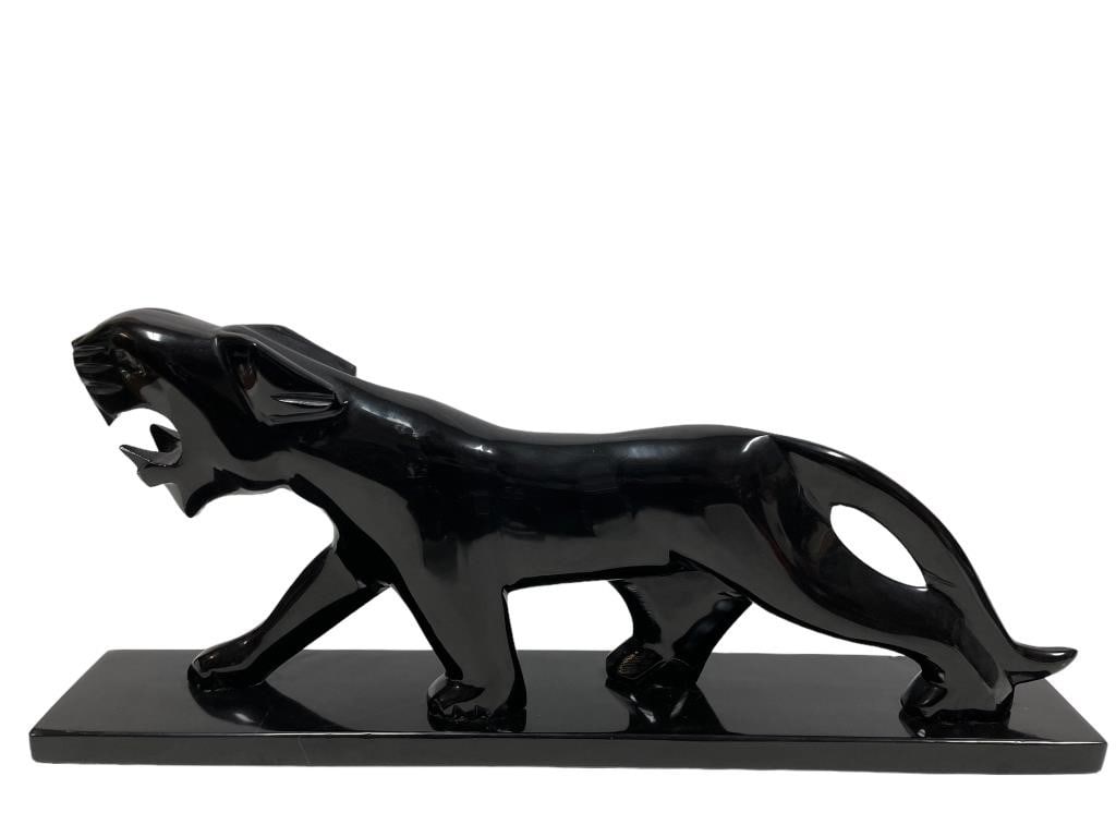 LRG MID CENTURY CARVED ONYX JAGUAR SCUPTUE 23": LARGE MID CENTURY STYLE CARVED ONYX JAGUAR SCUPTURE -10" X 23" X 3" APPROX -VERY GOOD PRE OWNED CONDITION, SMALL CHIP TO BASE -DP11223STORE
