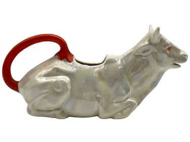 VINTAGE POTTERY RECLINING COW CREAMER