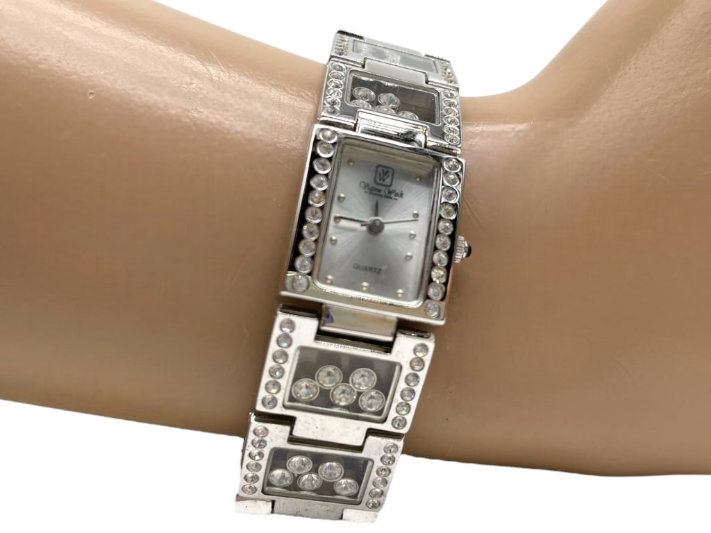 VICTORIA WIECK BEVERLY HILLS WOMEN'S WATCH: VICTORIA WIECK BEVERLY HILLS WOMEN'S WATCH -VERY GOOD CONDITION, COMES WITH BOX -APPROX 7.5" -STAINLESS STEEL -STAMPED ON BACK -JA 120224 FRONT ***Please note that due to limited storage space, all it