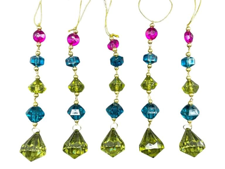 SET OF 5 GREEN AND BLUE JEWELED WINDOW ORNAMENTS: SET OF 5 GREEN AND BLUE JEWELED WINDOW ORNAMENTS -NEW! -SET OF 5 -APPROX 6.5" LONG -JA 112624 ***Please note that due to limited storage space, all items must be picked up within 14 days of the auctio