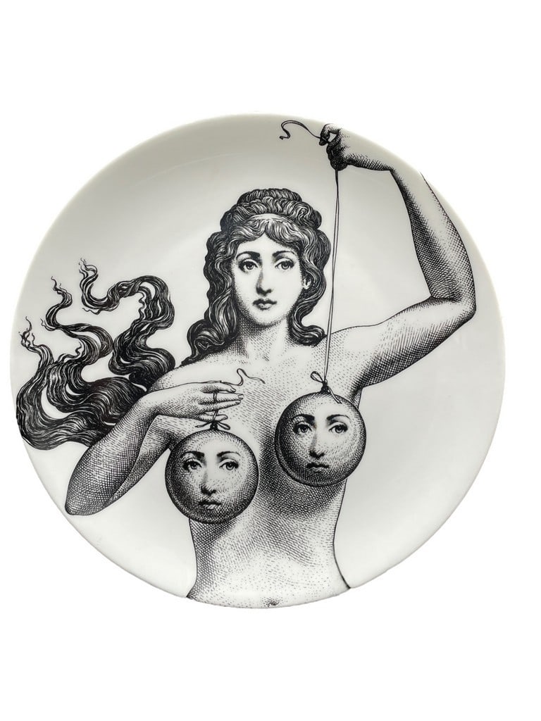 PIERO FORNASETTI WALL PLATE NO.182 10": FORNASETTI WALL PLATE CHARGER NO.182 -10" DIAMETER APPROX -VERY GOOD PRE OWNED CONDITION -DP121624 ***Please note that due to limited storage space, all items must be picked up within 14 days of the a