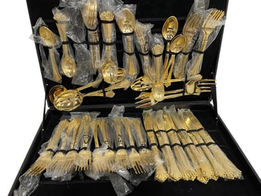 GOLD FLATWARE SET IN BOX