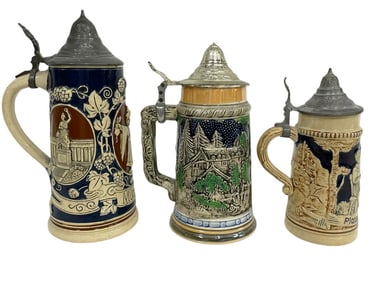 THREE ASSORTED GERMAN STEINS 9", 8", 7"