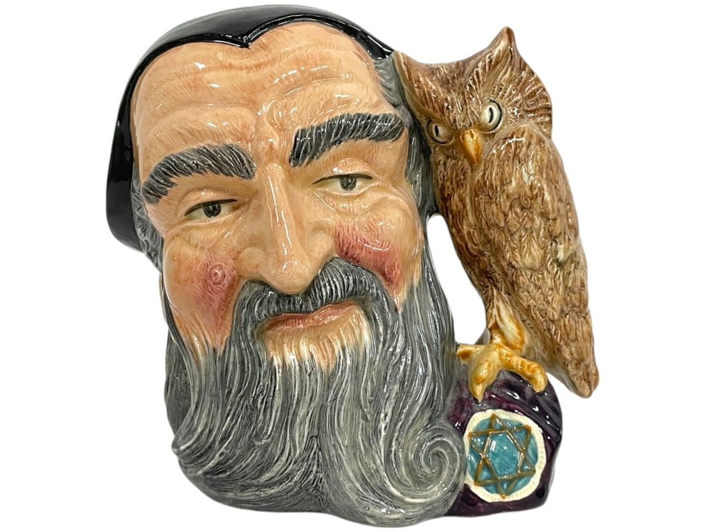 ROYAL DOULTON MERLIN COLLECTIBLE MUG: ROYAL DOULTON MERLIN COLLECTIBLE MUG -VERY GOOD PRE OWNED CONDITION -APPROX 7.5" X 6.5" -JA 122624 #17 ***Please note that due to limited storage space, all items must be picked up within 14 days of t