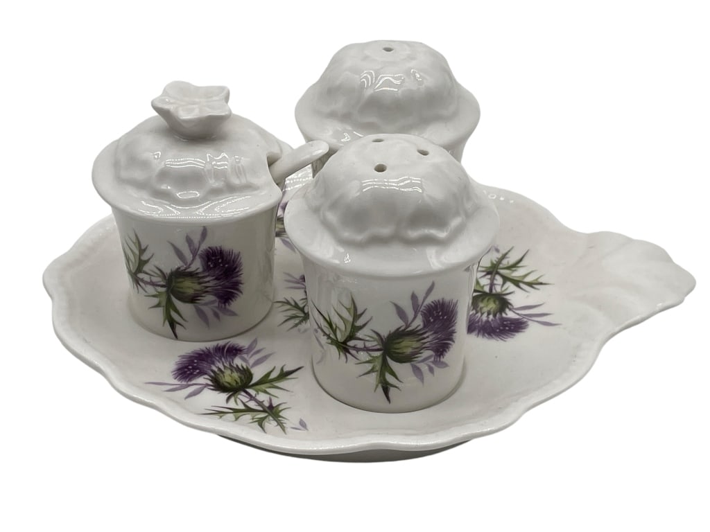 LUCKENBOOTH BONE CHINA PURPLE FLOWER SET 4 PIECES: LUCKENBOOTH BONE CHINA PURPLE FLOWER SET 4 PIECES -VERY GOOD PRE OWNED CONDITION -APPROX 6" PLATE -4 PIECE SET INCLUDING PLATE, SALT AND PEPPER SHAKER, AND LIDDED CANISTER WITH SPOON -MADE IN SCOTLAND