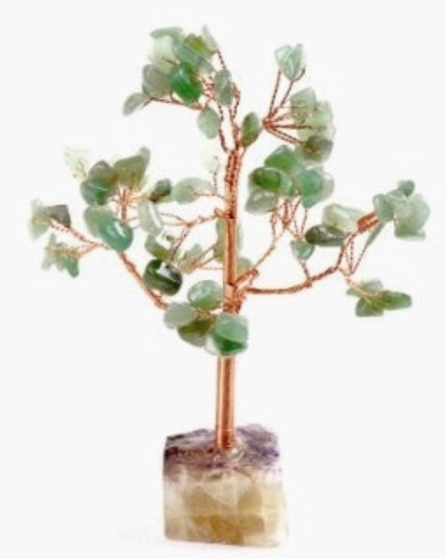 NEW! LUCKY STONE JADE TREE: NEW! LUCKY STONE JADE TREE -A symbol of life and good energy - our lucky stone tree features a beautiful assortment of natural jade pieces. Each branch can be moved - and the entire tree is mounted on