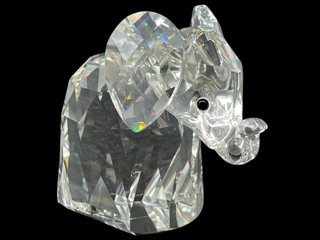 SWAROVSKI CRYSTAL ELEPHANT FIGURINE W/ SILVER TAIL: SWAROVSKI CRYSTAL ELEPHANT FIGURINE W/ SILVER TAIL 2.25" -VERY GOOD PRE OWNED CONDITION -APPROX 2.25" -JA 021325 ***Please note that due to limited storage space, all items must be picked up within 14