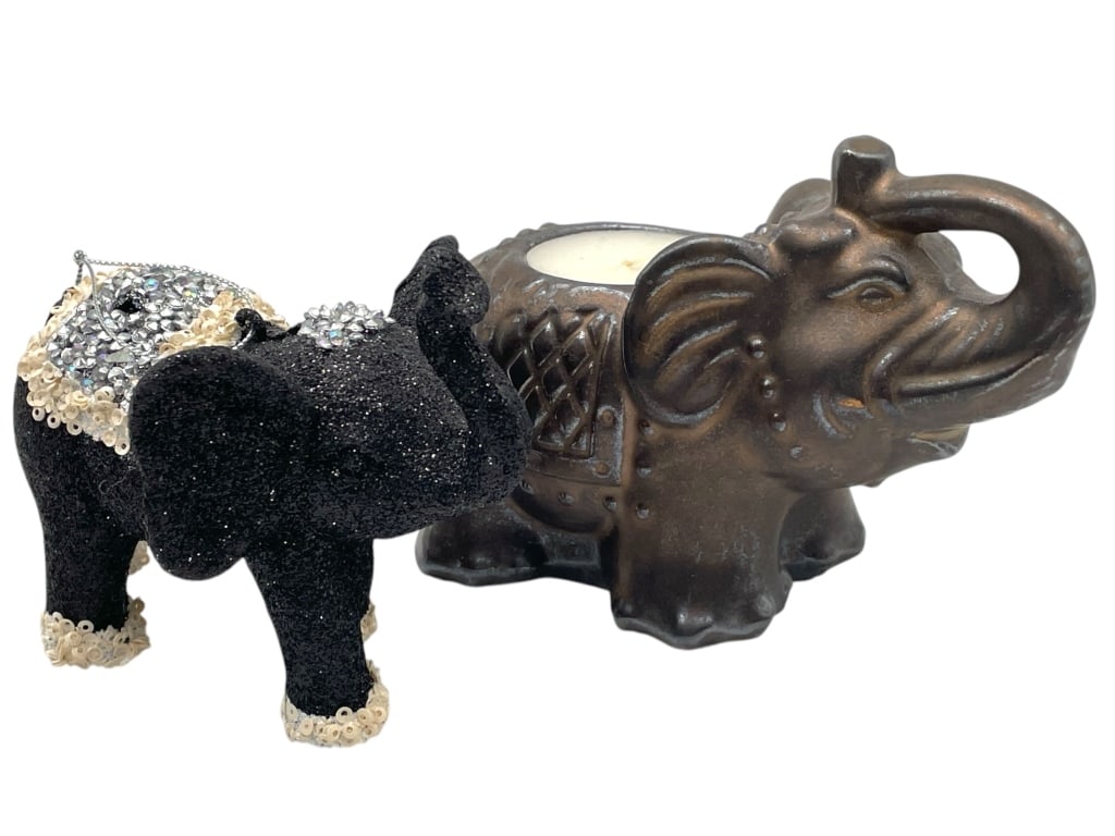 ELEPHANT ORNAMNET AND CANDLE HOLDER: ELEPHANT ORNAMNET AND CANDLE HOLDER -GOOD PRE OWNED CONDITION, SEE PHOTOS -TWO PIECES -JA 022125 ***Please note that due to limited storage space, all items must be picked up within 14 days of the auc