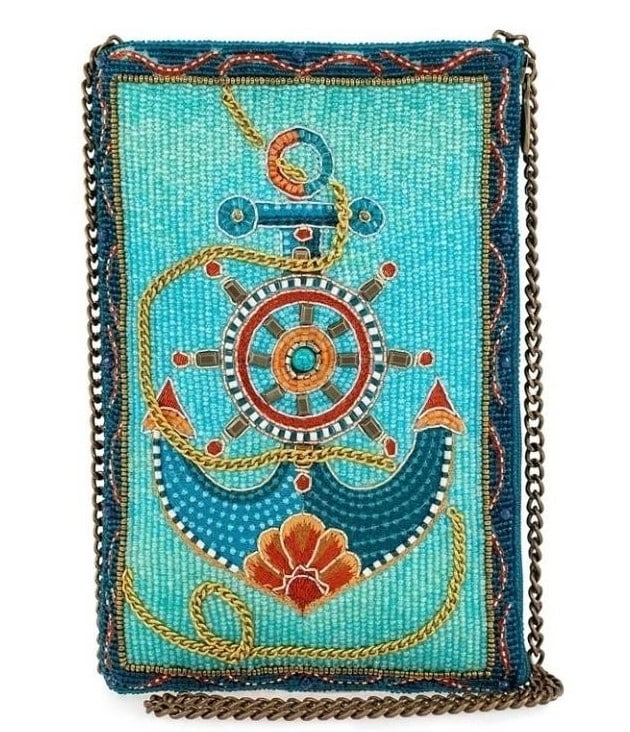 NEW MARY FRANCES ANCHORS AWAY CROSSBODY HANDBAG: NEW MARY FRANCES ANCHORS AWAY CROSSBODY HANDBAG Set sail on a fashion voyage with this nautical-themed mini crossbody handbag. With its striking anchor centerpiece steering a course through waves of t