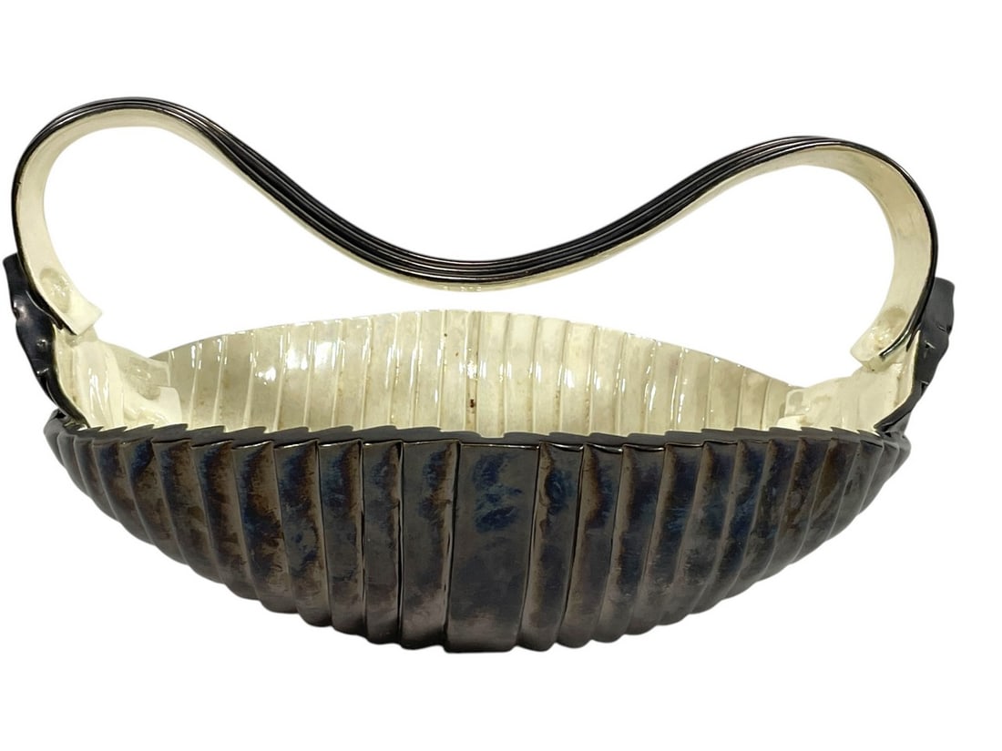 POST MODERN CERAMIC BASKET 10": POST MODERN CERAMIC BASKET -10" X 18" X 15" APPROX -VERY GOOD PRE OWNED CONDITION -DP2625