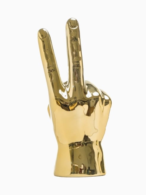 Gold Peace Hand Table Top - 8" Tall: Invite a little life into your office or living space. Display your favorite jewelry and other hand accessories. Specifications: - Imported - Material: Ceramic - Color: Gold - Weight: 1 lbs. - Dimensi