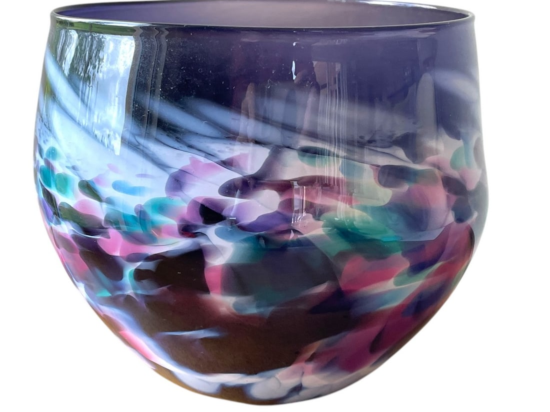 MURANO STYLE ART GLASS SWIRL VASE 6": MURANO STYLE ART GLASS VASE -6" X 6" D APPROX -THIS HAND-BLOWN ART GLASS VASE FEATURES A CLOUD-LIKE SWIRL OF COLORS, INCLUDING PURPLE, TEAL, PINK, AND WHITE, CREATING A DREAMY, ABSTRACT DESIGN. ITS RO