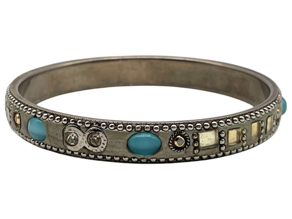 SILVER BANGLE BRACELET W/ BLUE GEMSTONES: SILVER BANGLE BRACELET W/ BLUE GEMSTONES -GOOD PRE OWNED CONDITION, MISSING A GEMSTONE (SEE PHOTOS) -APPROX 2.75" -JA 030625 ***Please note that due to limited storage space, all items must be picked 