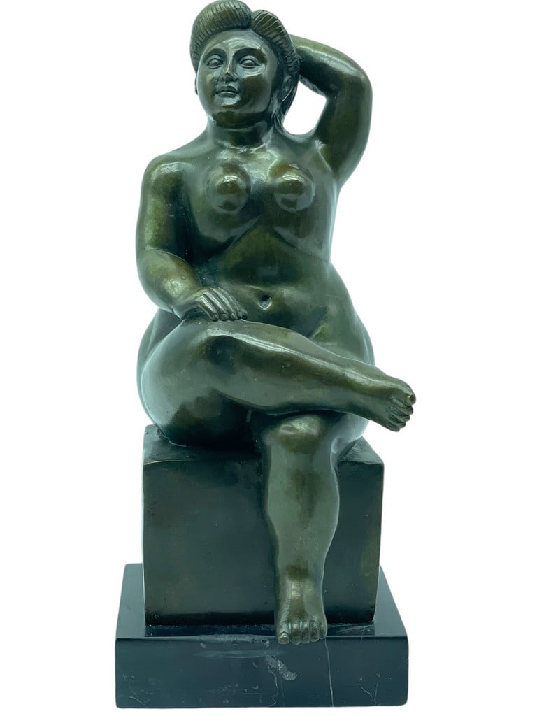 AFTER BOTERO BRONZE NUDE W HAND BEHIND HEAD 11": AFTER FERNANDO BOTERO NUDE BRONZE WOMAN SITTING WITH ON LEG ON HER KNEE AND ONE HAND BEHIND HER HEAD -11" H APPROX -VERY GOOD PRE OWNED CONDITION -DP91624