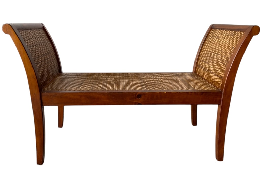 VINTAGE PIER 1 COASTAL CANE AND WOOD BENCH 44": VINTAGE PIER 1 CANE AND WOOD BENCH -ELEGANT VINTAGE BENCH WITH A SOLID WOOD FRAME AND CANE SEAT AND BACK PANELS. FEATURES CURVED ARMS AND A TIMELESS DESIGN. GREAT FOR ENTRYWAYS, BEDROOMS, OR LIVING SP