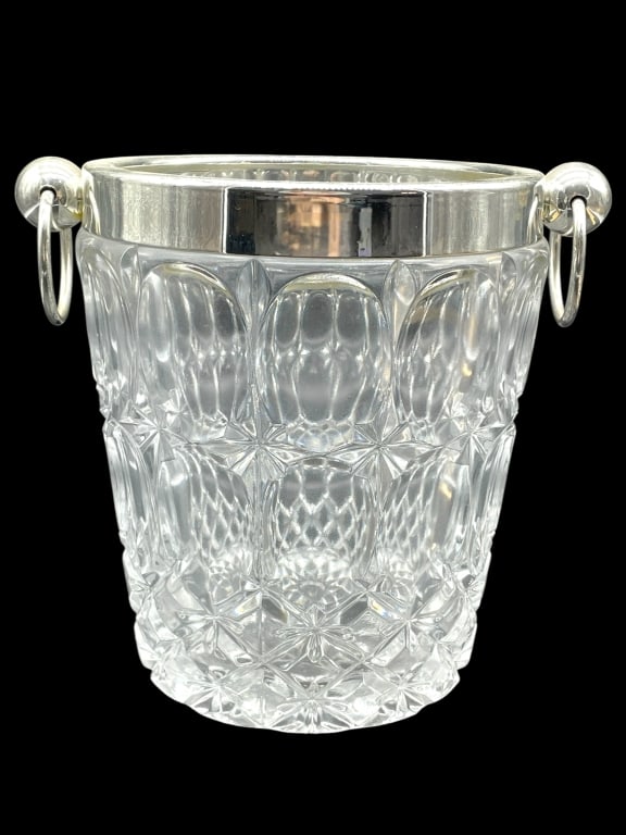CAROLE STUPELL CUT GLASS CHAMPAGNE BUCKET 9": CAROLE STUPELL COLLECTION CUT GLASS CHAMPAGNE BUCKET W/ SILVER RIM 9" -VERY GOOD PRE OWNED CONDITION -APPROX 9" -JA 031225 By bidding on this item, you have read, understand and agree to the terms and