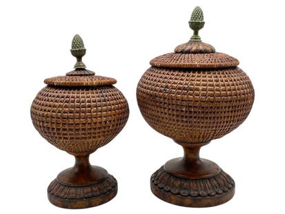 MAITLAND SMITH PAIR OF RATTAN LIDDED CANISTERS 13": MAITLAND SMITH PAIR OF RATTAN LIDDED CANISTERS 13" -VERY GOOD PRE OWNED CONDITION -APPROX 13" AND 11" -FOOTED BASE AND PINEAPPLE FINIAL TOPS – RICH ANTIQUE-STYLE FINISH WITH CLASSICAL DESIGN INFLUEN