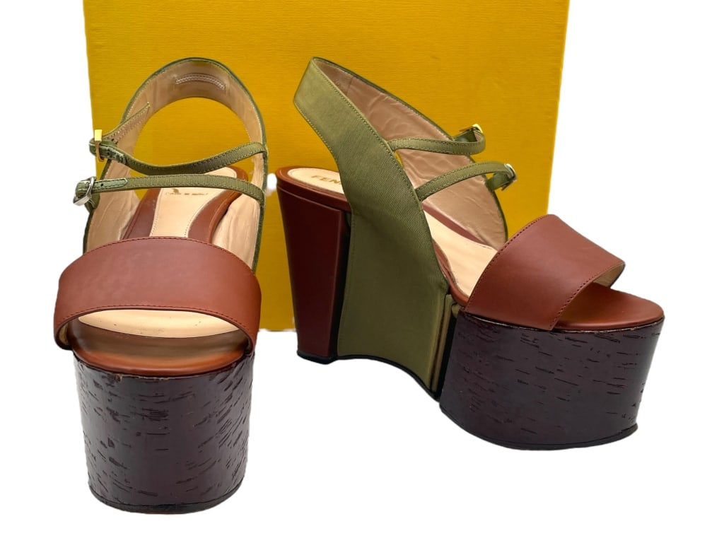FENDI COLORBLOCK PLATFORM SLINGBACK SANDALS SZ37: FENDI COLORBLOCK PLATFORM SLINGBACK SANDALS SZ37 -VERY GOOD PRE OWNED CONDITION -COMES WITH BOX -SIZE 37 -FENDI PLATFORM WEDGE SANDALS IN EARTHY TONES OF OLIVE GREEN AND RICH BROWN. FEATURES WIDE LEAT