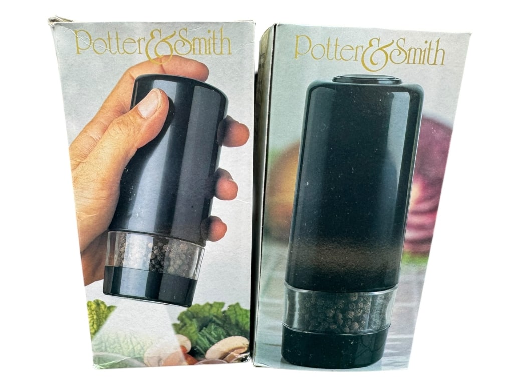 PAIR OF PEPPER GRINDERS: PAIR OF PEPPER GRINDERS - By bidding on this item, you are abiding by the terms and conditions for each auction.