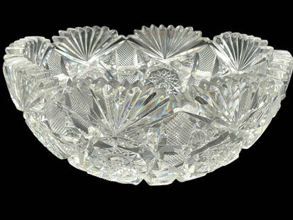 AMERICAN BRILLIANT CUT GLASS BOWL 11": AMERICAN BRILLIANT CUT GLASS BOWL -HEAVYWEIGHT AMERICAN BRILLIANT CUT GLASS BOWL WITH RICHLY CUT FAN, STAR, AND CROSSHATCH MOTIFS. SCALLOPED EDGE AND BRILLIANT REFRACTION. IMPRESSIVE CENTERPIECE OR DI