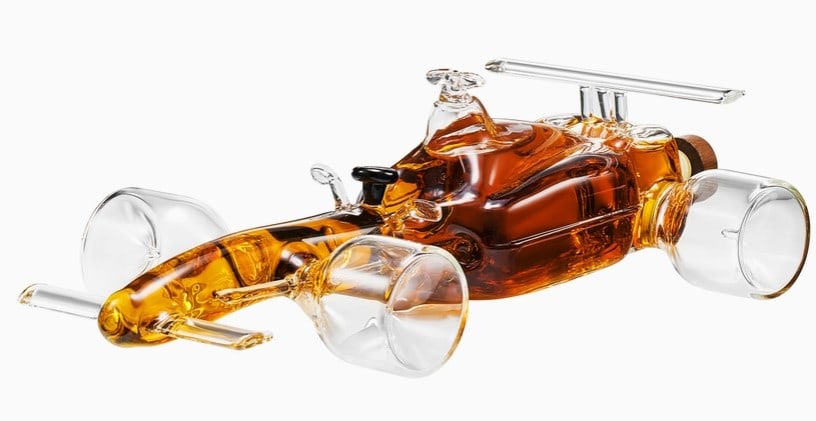 New In Box F1 Racecar Car Lover Whiskey Decanter: New In Box F1 Racecar Car Lover Whiskey Decanter F1 Racecar Car Lover Whiskey Decanter - 8.12oz SLEEK DESIGN INSPIRED BY FORMULA 1: The F1 Racecar Whiskey Decanter captures the speed and sophisticatio