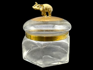 ELEPHANT AND GLASS LIDDED CANISTER 8"