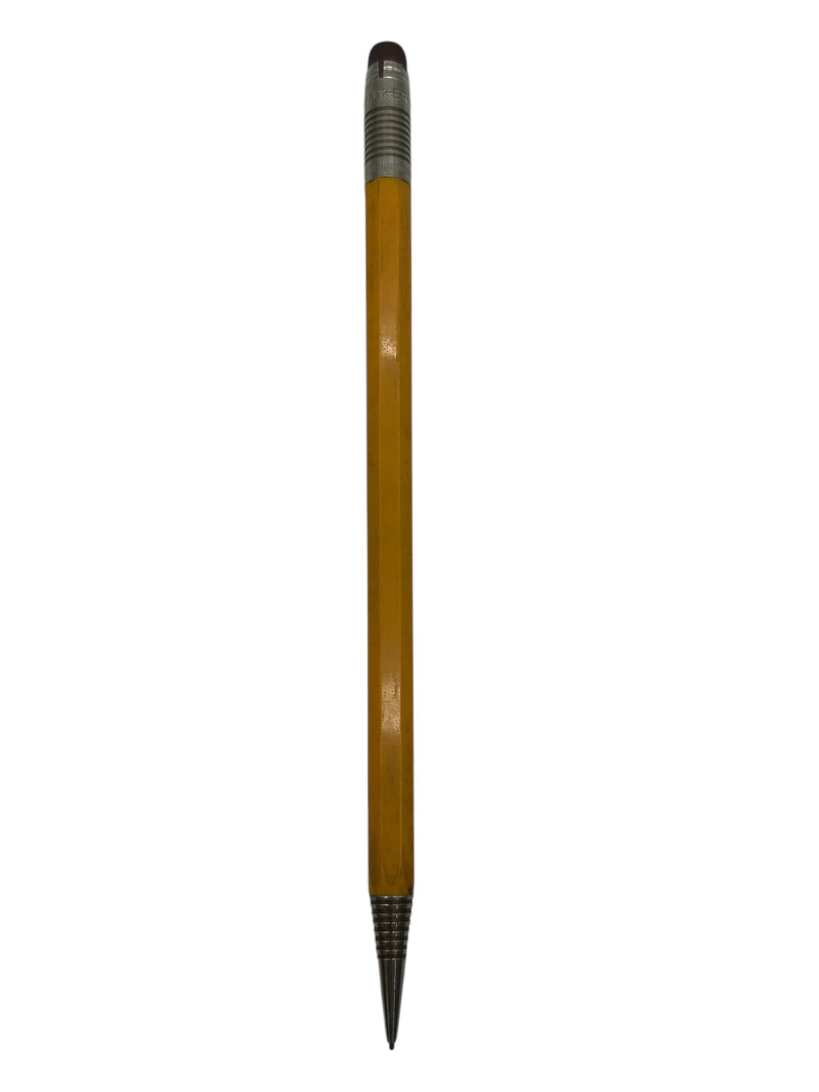 VINTAGE PARKER MODEL 100 MECHANICAL PENCIL: - ADD A TOUCH OF CLASSIC MID-CENTURY DESIGN TO YOUR COLLECTION WITH THIS PARKER MODEL 100 MECHANICAL PENCIL, FEATURING A STRIKING OVERSIZED FORM MIMICKING A TRADITIONAL NO. 2 PENCIL. THE HEXAGONAL YEL