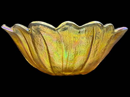 ANTIQUE CARNIVAL GLASS RUFFLED SUNFLOWER BOWL 3": - STRIKING AND COLORFUL EARLY 20TH CENTURY CARNIVAL GLASS BOWL FEATURING A SUNFLOWER DESIGN WITH RAISED DETAIL AND A SCALLOPED, RUFFLED RIM. THE IRIDESCENT GOLD SURFACE REFLECTS SHIMMERING HUES OF PIN