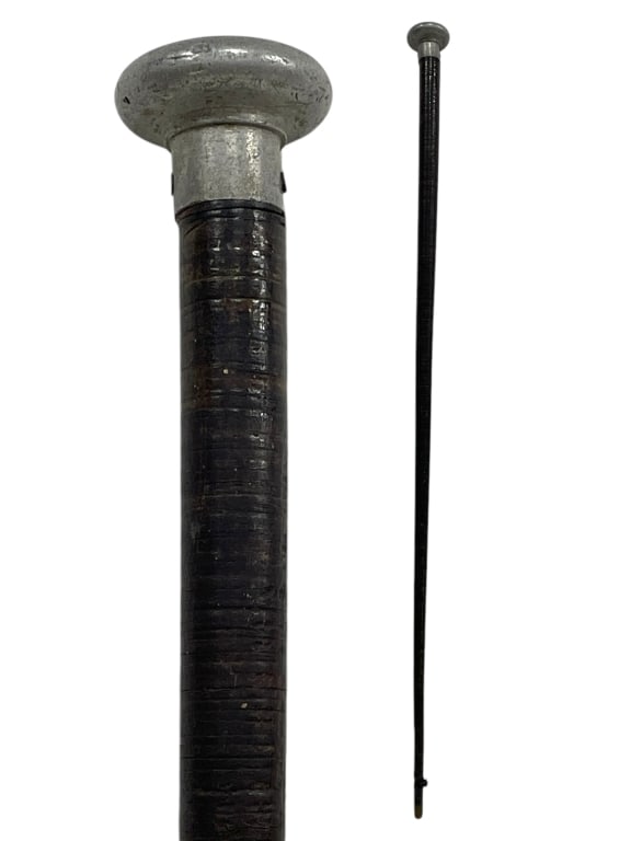 WALKING STICK WITH METAL CAP KNOB HANDLE 34": WALKING STICK WITH METAL CAP KNOB HANDLE 34" -VERY GOOD PRE OWNED CONDITION -APPROX 34" -SLENDER TAPERED SHAFT WRAPPED IN DARK LACQUERED FINISH WITH TURNED RING DETAIL. FLATTENED ROUND METAL TOP OFFER