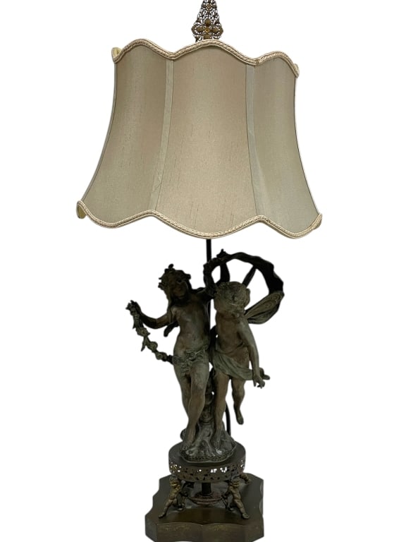 BRONZE ROMANTIC CHERUB FIGURAL LAMP 32": AFTER AUGUST MOUREAU BRONZE ROMANTIC FIGURAL LAMP WITH CHERUBS -STUNNING SCULPTURAL LAMP DEPICTING A MALE AND FEMALE CHERUB FIGURES IN AN EMBRACE WITH FAIRY WINGS AND FLORAL DETAILS. SET ON AN ELEGANT