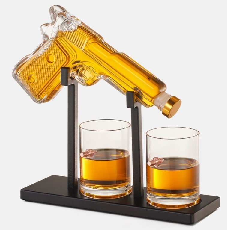 NIB PISTOL WHISKEY DECANTER SET W/ 2 GLASSES: Pistol Whiskey Decanter Set 7.7 oz with Two 10.5 oz Glasses The perfect gift to give or receive: How about a gift for birthdays, Father's Day, anniversaries, Christmas, etc.? A gift that is both decor