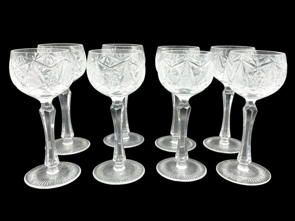 8 NACHTMANN TRAUBE STYLE CLEAR CUT CRYSTAL GLASSES: – SET OF EIGHT CUT CRYSTAL WINE GOBLETS 6" – BRILLIANT PERIOD STYLE WITH DEEP GEOMETRIC CUTS INCLUDING STARS AND CROSSHATCHING – PANEL-CUT STEMS WITH INTRICATE NOTCHING – ROUNDED BASES WITH RA