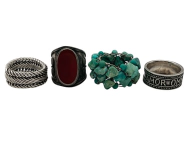 LOT OF 4 STATEMENT RINGS