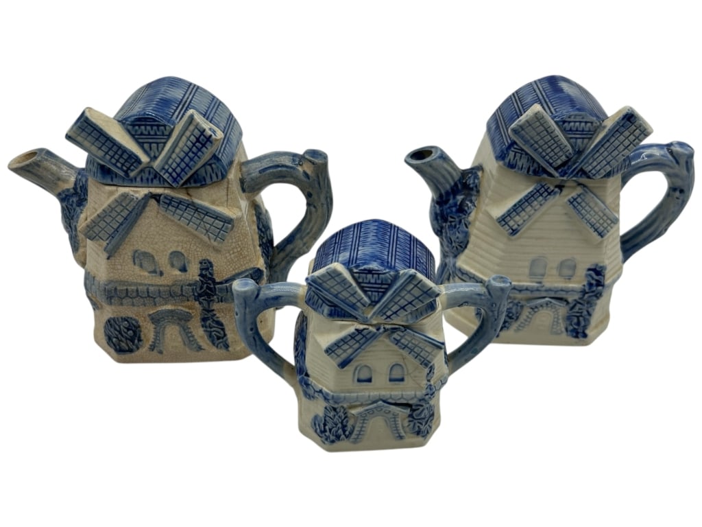 SET OF 3 VINTAGE DUTCH BLUE & WHITE TEA POTS 5.5": - SET OF 3 VINTAGE DUTCH BLUE & WHITE WINDMILL TEAPOTS – DELIGHTFUL CERAMIC TEAPOTS DESIGNED IN THE SHAPE OF TRADITIONAL DUTCH WINDMILLS. EACH FEATURES HAND-PAINTED BLUE-AND-WHITE DETAILING WITH TEX