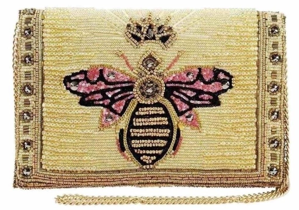 NEW! MARY FRANCES BUZZED CROSSBODY HANDBAG: NEW! MARY FRANCES BUZZED CROSSBODY HANDBAG -Bee the best dressed girl in town. Glammed out and gold- this clutch crossbody will dress up your date pm! Dimensions (W x D x H"): 8.75 x 2.5 x 6" Strap Le