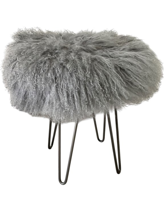 MODERN GRAY MONGOLIAN SHEEPSKIN STOOL: MODERN GRAY MONGOLIAN SHEEPSKIN STOOL FEATURING A LUXURIOUSLY SOFT AND FLUFFY TEXTURE SET ATOP SLEEK HAIRPIN METAL LEGS IN A BRUSHED FINISH. THIS PLAYFUL YET STYLISH ACCENT PIECE ADDS A TOUCH OF WHIMS